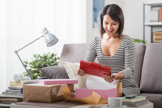 Woman unboxing a parcel