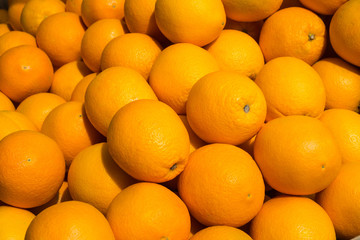  many orange fruits - orange fruit background