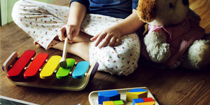 Kid Playing Xylophone Toy Enjoy Concept