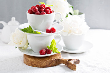 Fresh raspberries in stacked cups