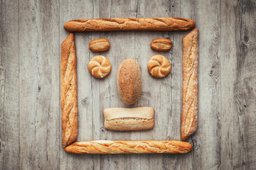Funny face composed of bread
