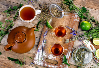 Herbal tea on rustic background.