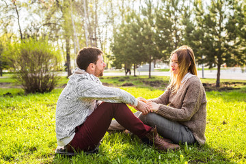 Outdoor Portrait of young couple in autumn