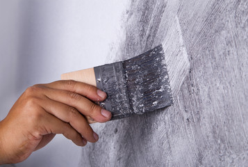 hand use brush for color paint concrete Loft style on wall
