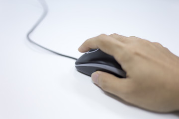 Closeup of Man hand clicking mouse

