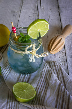 freshly made drink gin and tonic with lime and cucumber slices