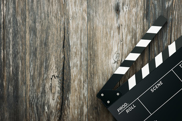 Clapper board on wood
