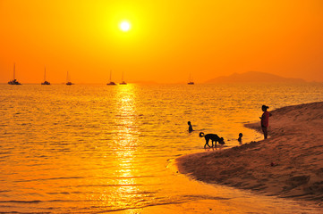 Fototapeta premium People on Sunset Beach