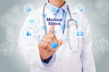 Fototapeta na wymiar Doctor hand touching medical ethics sign on virtual screen. medical concept