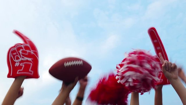 Tailgate: Group Of Fans Cheer Against Blue Sky