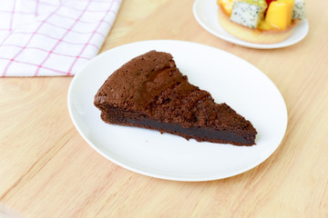 chocolate cake on wood table.