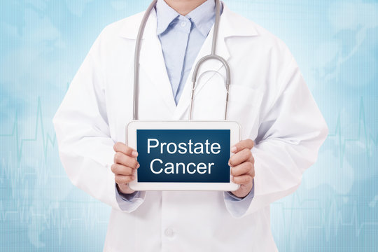 Doctor holding a tablet pc with prostate cancer sign on the display
