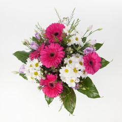 Pink and white flowers bouquet seen from above