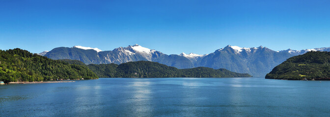 Beautiful panoramic view of Chilean fjords: Aysen fjord and Puerto Chacabuco surrounding area, Patagonia, Chile, South America. - obrazy, fototapety, plakaty