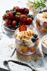 fresh fruit dessert with custard, vertical top view