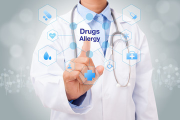 Doctor hand touching drugs allergy sign on virtual screen. medical concept