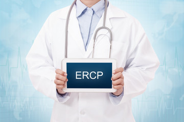 Doctor holding a tablet pc with ERCP sign on blue background