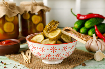 Spicy cucumbers with garlic in tomato marinade