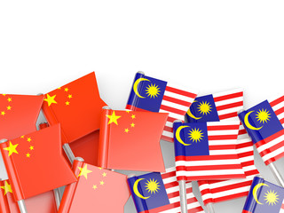Fototapeta na wymiar Flags of China and Malaysia isolated on white