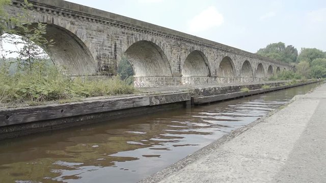 Scenic shot of the world famous Chirk Aqueduct built in 1801 by Thomas Telford. This impressive canal aqueduct has a bigger brother by the side for rail transportation. Located on the Llangollen Canal