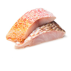 Red Snapper fish fillets isolted on a white background.