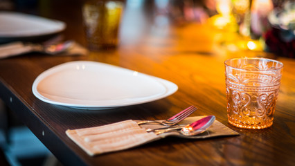 Dining sets , plates , spoons , glasses, tableware .