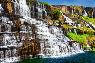 Beautiful natural cascades of waterfall with crystal clear water