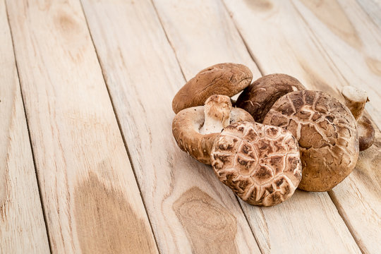 Shiitake mushroom on wooden table