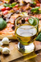 Fresh pizza served on wooden table