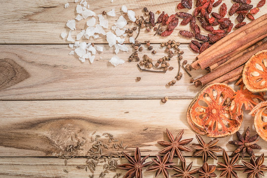 Ingredients for Chinese herbal medicine on wooden background