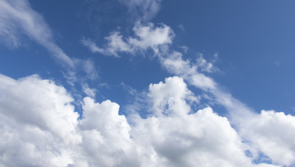 White clouds in a dark blue sky in Europe