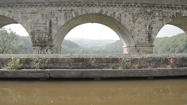 Scenic shot of the world famous Chirk Aqueduct built in 1801 by Thomas Telford. This impressive canal aqueduct has a bigger brother by the side for rail transportation. Located on the Llangollen Canal