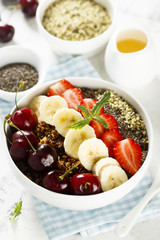 Breakfast bowl with fruits, seeds and berries