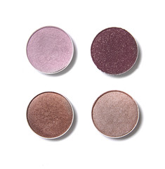 Neutral and pink toned eye shadow make up quad isolated on a white background