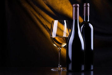 Wine bottles and a glass
