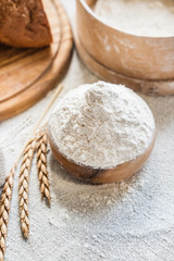 Fototapeta na wymiar wheat and flour on the table