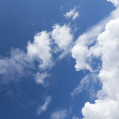White clouds in a dark blue sky in Europe