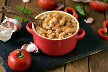 potaje de garbanzos, a spanish chickpeas stew, on a wooden table