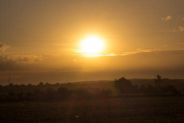 yellow sun rises