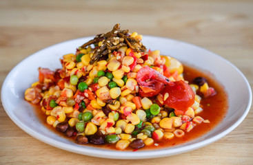 Som Tum or corn Salad, Corn Pok Pok, Thai Traditional Cuisine, Popular Thai Food. Rustic still life style.