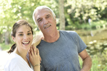 Portrait of man with daughter
