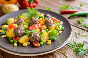 Meatballs with fried vegetable