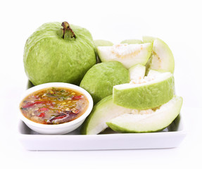 Guava fruit and Salt, pepper, dip fruit on white background
