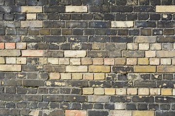 New bricks in wall to replace damaged or decayed bricks 