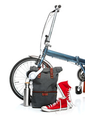 The new modern bicycle and suitcase, sneakers, thermos