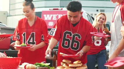 Tailgate: Friends Getting Food At Party Before Game