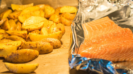 Salmon Fish with rosemary potatoes, baked in the oven.