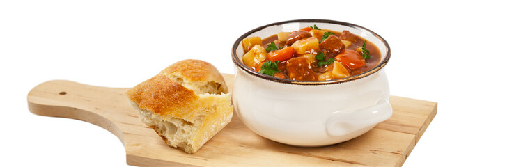 Slow Cooker Beef Stew Isolated on white. Selective focus.