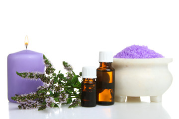 Fototapeta na wymiar essential oil with bath salt isolated on white background.The concept of aromatherapy