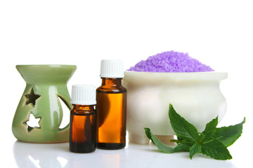 essential oil with bath salt isolated on white background.The concept of aromatherapy